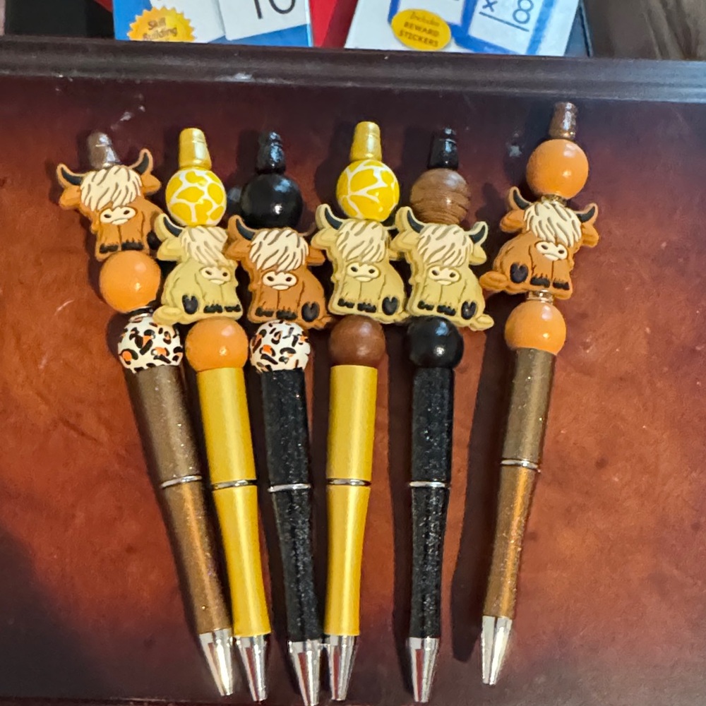 Animal Themed Pens with Orange and Black Accents